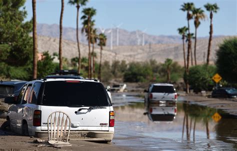 California mountain and desert towns dig out of the mud from 1st tropical storm in 84 years